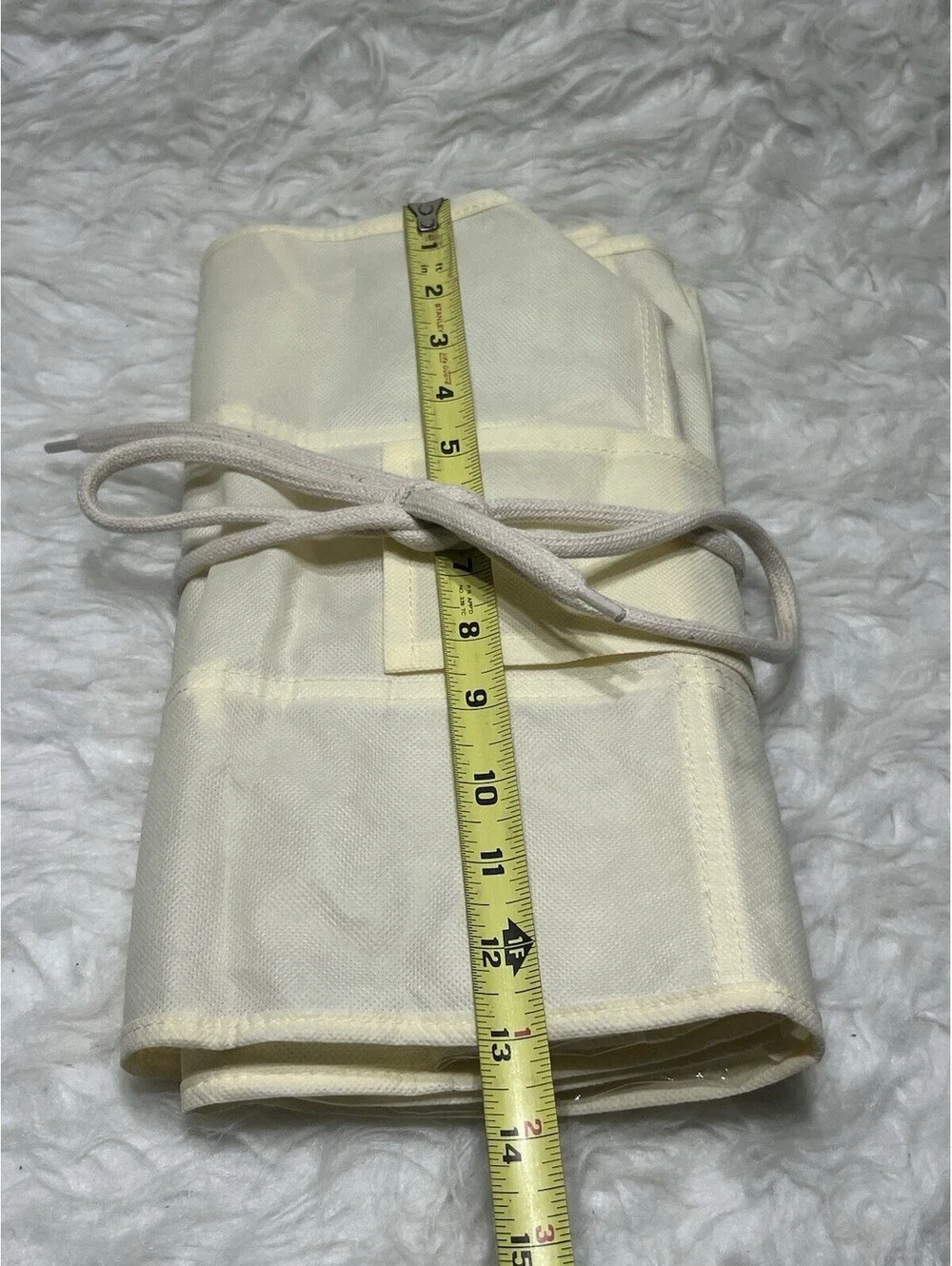 biege multi-pocket hanging closet organizer